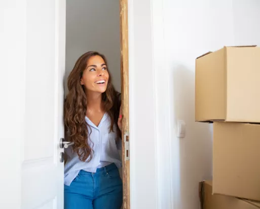 Woman opening a door